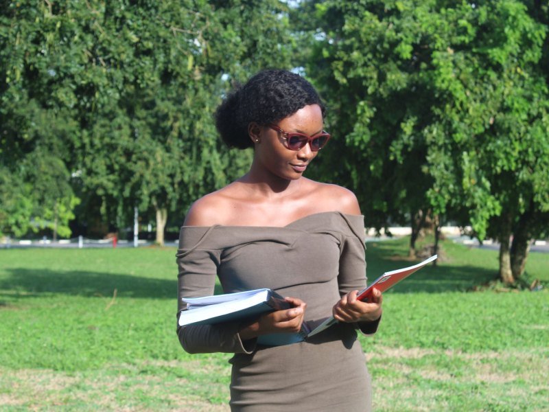 Student on campus going through her notebooks